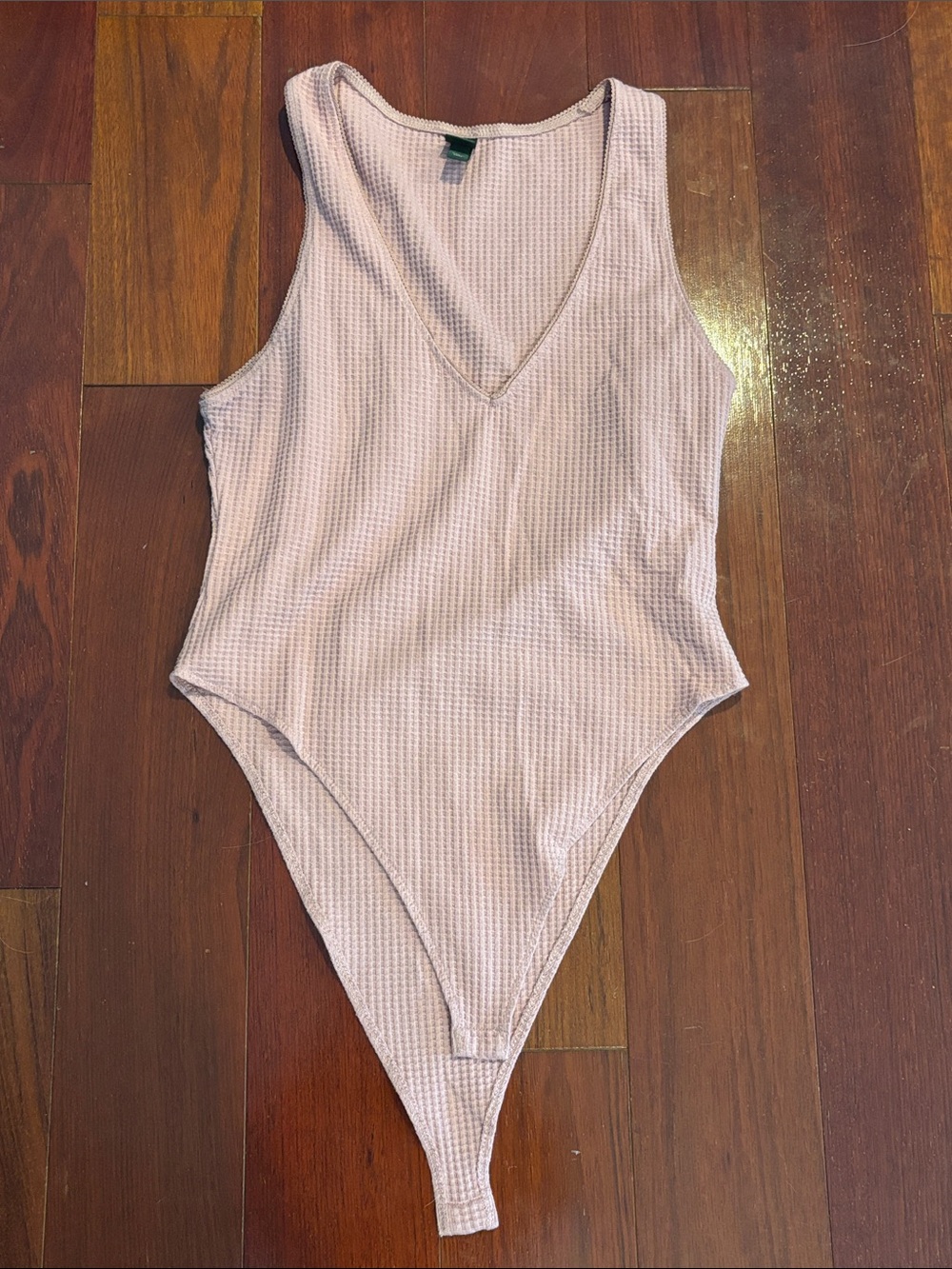 Women’s Ribbed Light Pink One-Piece Bodysuit